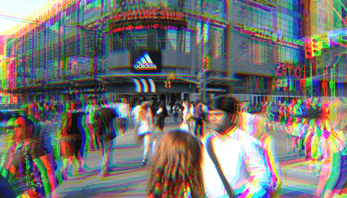 A screenshot of a video of a city crosswalk, with offset colors.